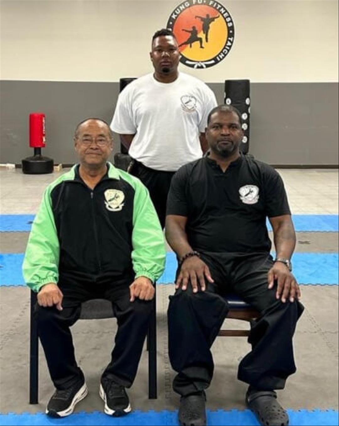 Chief Instructor Tearanie Hoyle, Master Derrick Wright, and Grandmaster Lee Kam Wing